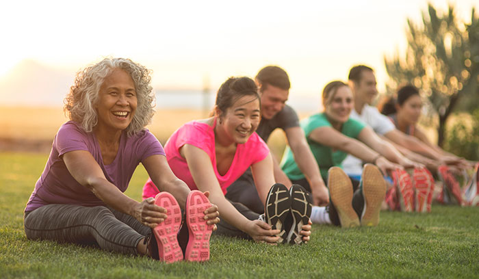 Group exercise stretching outside